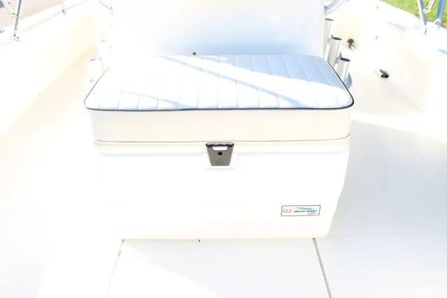 Slide: The Image of Bench seat on a 2017 Mako 21 LTS boat, white upholstery. - 14