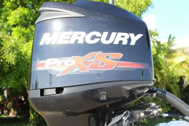 Slide: The Image of Mercury Pro XS outboard motor on a 2017 Mako 21 LTS boat. - 20