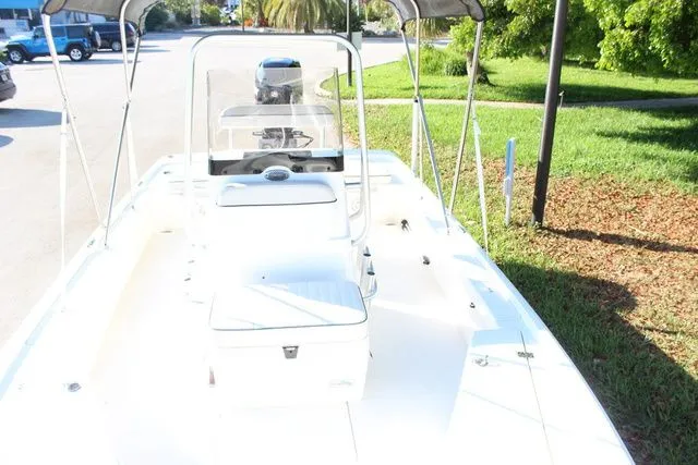 Slide: The Image of 2017 Mako 21 LTS boat parked with sunshade. - 8