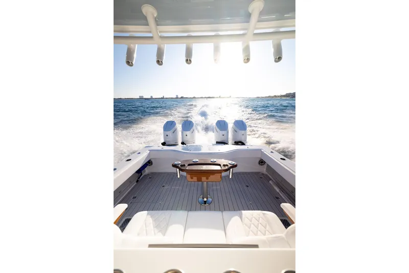 Slide: The Image of Freeman 42LR 2027 boat cruising on open water, showcasing powerful engines and sleek design. - 2