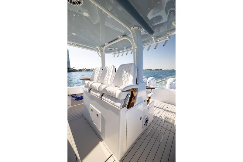 Slide: The Image of Luxurious seating on a 2027 Freeman 42LR boat, featuring elegant white upholstery. - 4