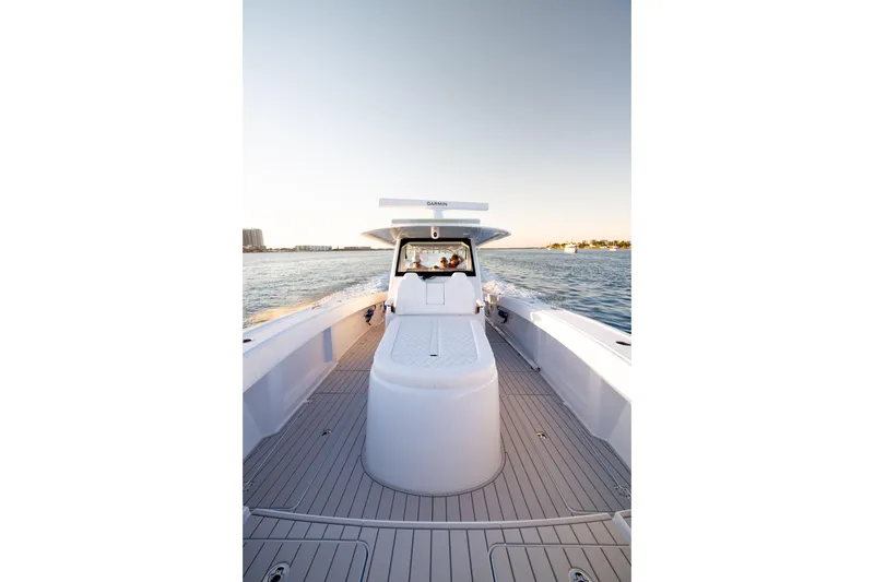 Slide: The Image of Freeman 42LR 2027 boat cruising on open water at sunset. - 5