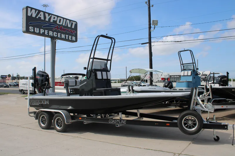 The Image of 2026 Freedom Boats 21' Commander on trailer at Waypoint Marine Supercenter. - 0