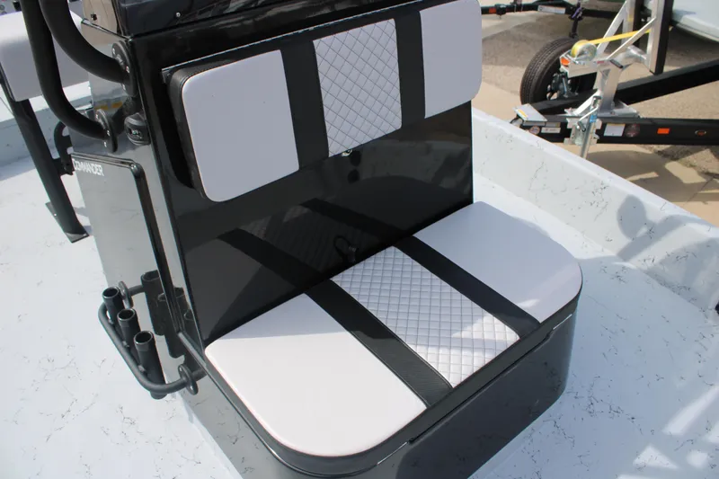 Slide: The Image of 2026 Freedom Boats 21' Commander seating with black and white cushioned design. - 16