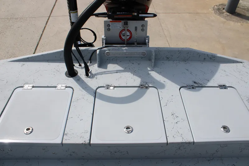 Slide: The Image of 2026 Freedom Boats 21' Commander with storage compartments and motor mount. - 21