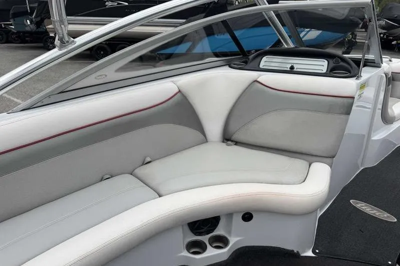 Slide: The Image of 2006 Tigé 22Ve boat interior with gray and white seating, sleek design. - 14