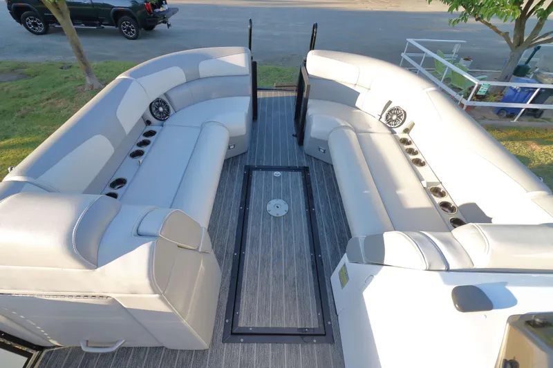 Slide: The Image of Luxurious seating on 2021 Montara Surf Boss 2.0 25 boat, featuring spacious interior design. - 8