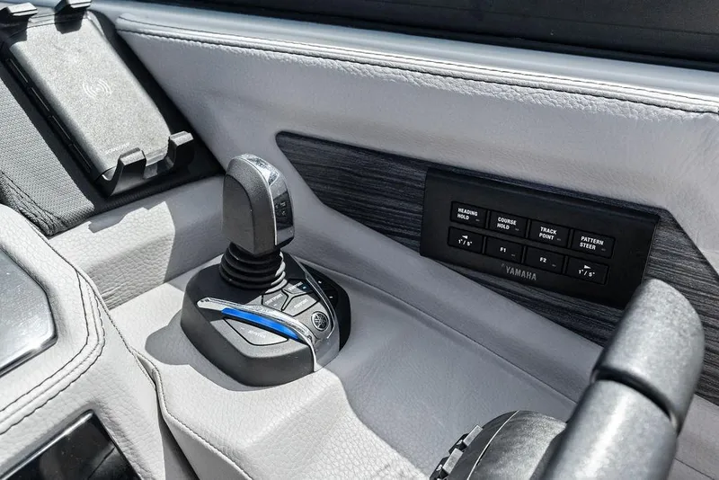 Slide: The Image of 2022 Cobalt R8 Outboard control panel with Yamaha joystick and navigation buttons. - 20