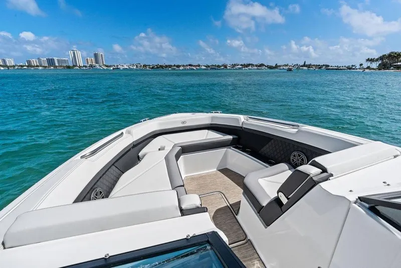 Slide: The Image of 2022 Cobalt R8 Outboard boat with spacious seating on a sunny day. - 6