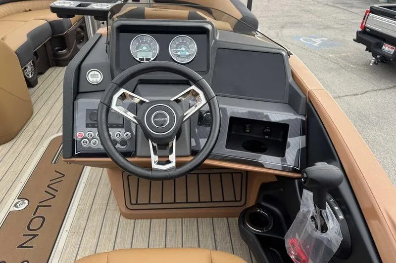 Slide: The Image of Steering console of 2026 Avalon 2385 25 Catalina QL boat with modern controls. - 11