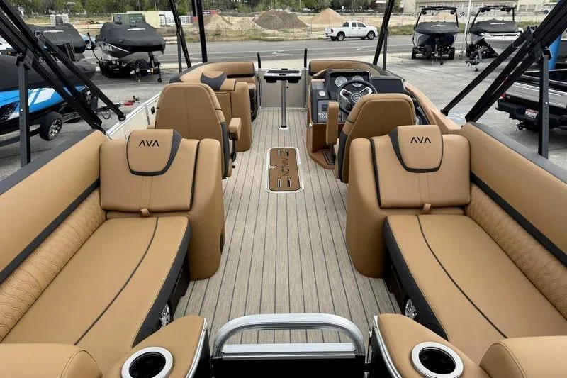 Slide: The Image of Luxurious interior of 2026 Avalon 2385 25 Catalina QL pontoon boat with tan seating. - 13