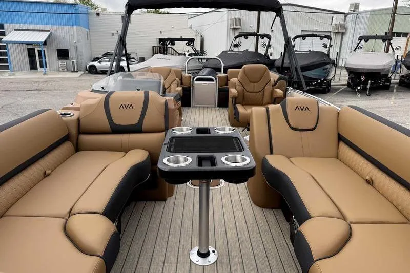 Slide: The Image of Luxurious interior of 2026 Avalon 2385 25 Catalina QL pontoon boat with tan seating. - 8