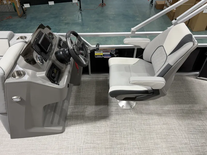Slide: The Image of Interior of 2026 Avalon VNT VRB21T with helm console and seat. - 13