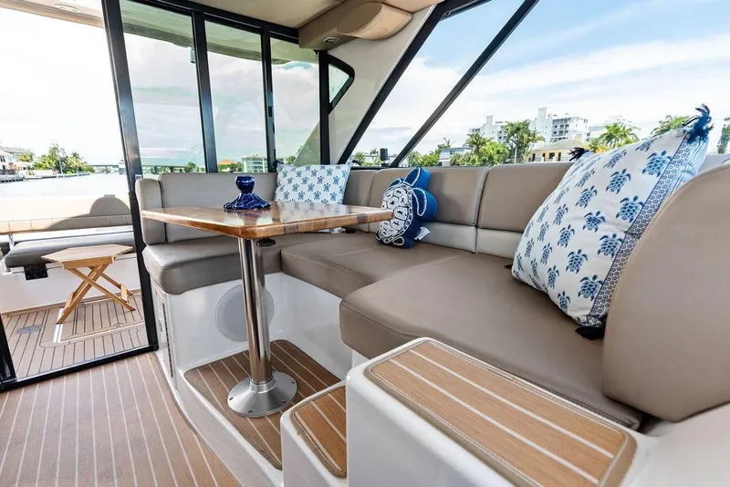 Slide: The Image of Luxurious interior of 2013 Regal 42 Sport Coupe with elegant seating and decor. - 24