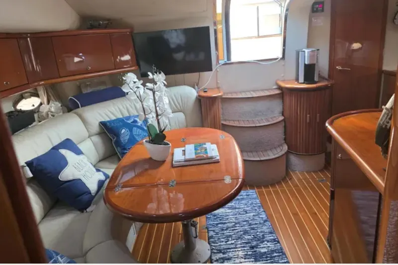 Slide: The Image of Luxurious interior of 2001 Sunseeker Camargue 44 yacht with elegant wood finishes. - 6