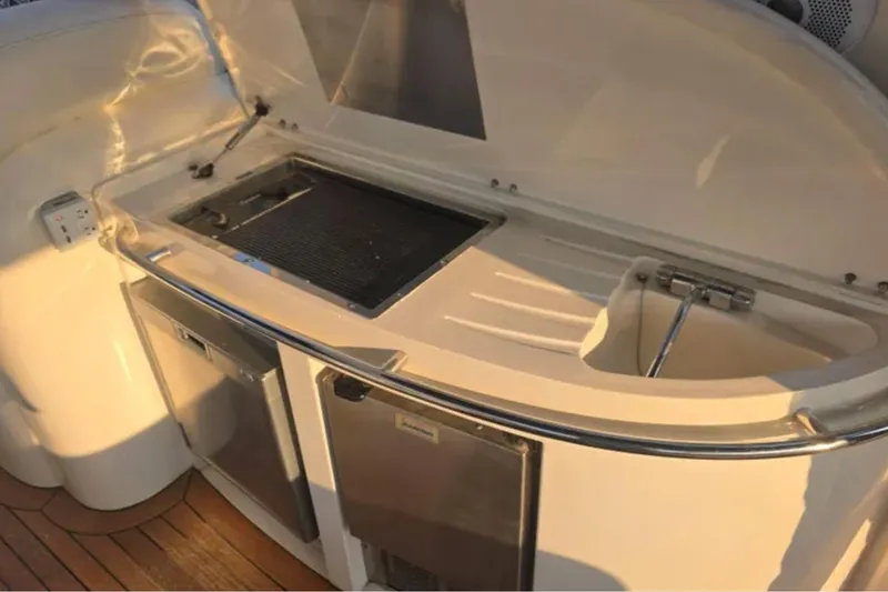 Slide: The Image of Outdoor kitchenette on 2001 Sunseeker Camargue 44 yacht with grill and sink. - 9
