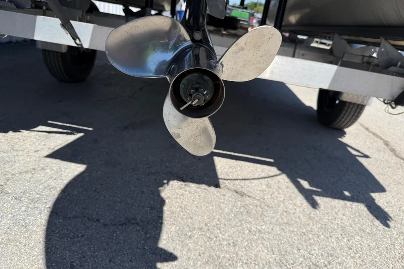 Slide: The Image of Propeller of 2023 Starcraft LX 18 F boat on trailer, close-up view. - 10