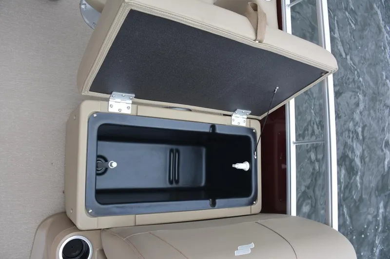Slide: The Image of Manufacturer Provided Image: 2023 Starcraft LX 18 F boat storage compartment with open lid. - 11