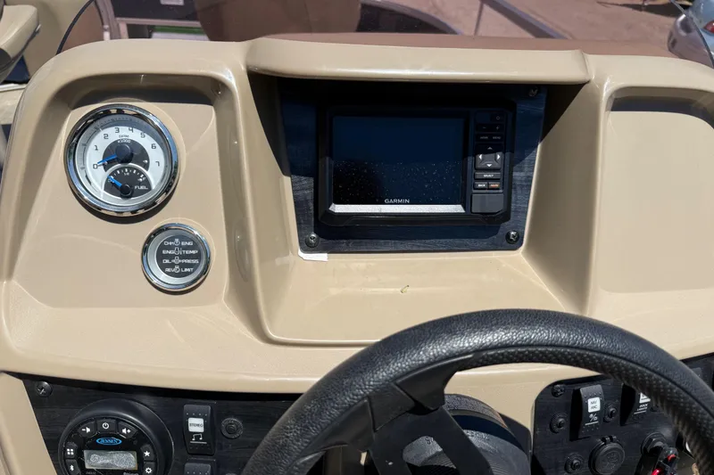 Slide: The Image of Dashboard of 2023 Starcraft LX 18 F boat with Garmin display and gauges. - 33
