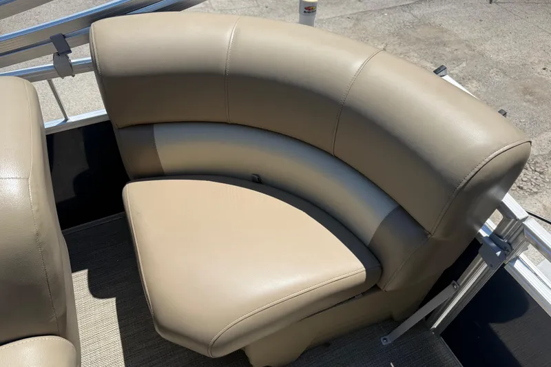 Slide: The Image of 2023 Starcraft LX 18 F boat with beige leather seating, showcasing luxury and comfort. - 40