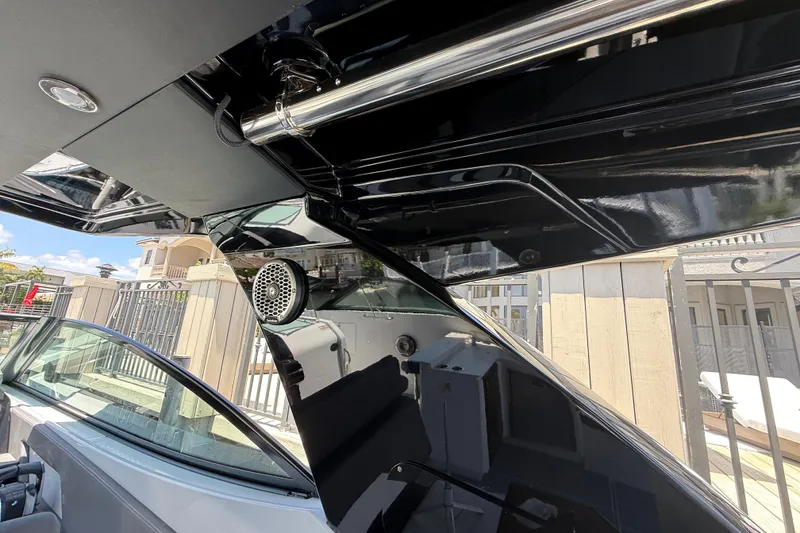 Slide: The Image of Interior view of 2021 Cruisers Yachts 38 GLS OB, showcasing sleek design and speaker system. - 23