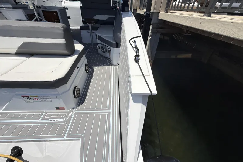 Slide: The Image of 2021 Cruisers Yachts 38 GLS OB interior with seating and dock view. - 31
