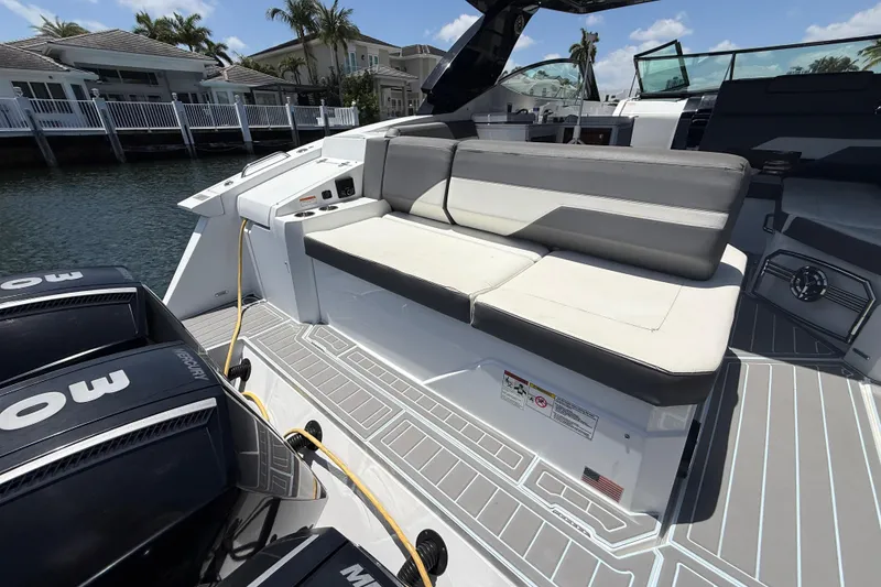 Slide: The Image of 2021 Cruisers Yachts 38 GLS OB with sleek seating and powerful Mercury outboard engines. - 32