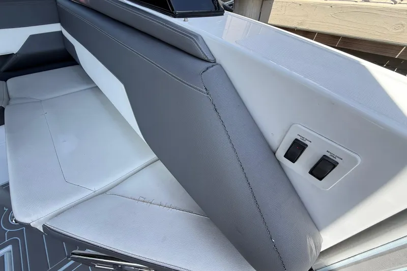 Slide: The Image of Interior seating and controls of 2021 Cruisers Yachts 38 GLS OB boat. - 35
