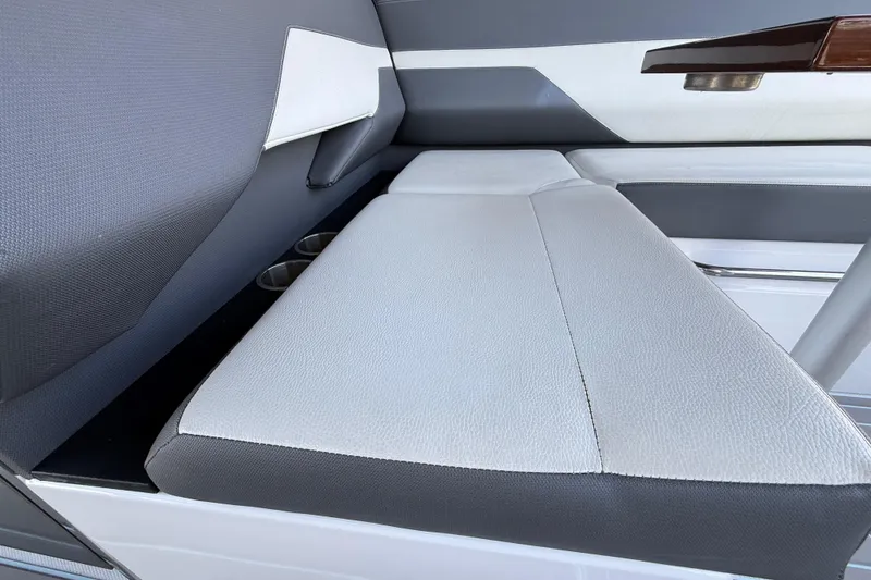 Slide: The Image of 2021 Cruisers Yachts 38 GLS OB interior seating with modern design and cup holders. - 38