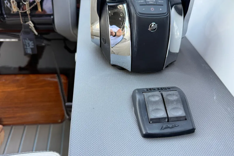 Slide: The Image of Control panel of 2021 Cruisers Yachts 38 GLS OB with throttle and switches. - 45