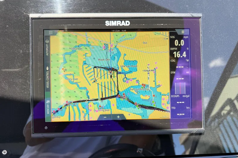Slide: The Image of Simrad navigation display on 2021 Cruisers Yachts 38 GLS OB, showing nautical map. - 47