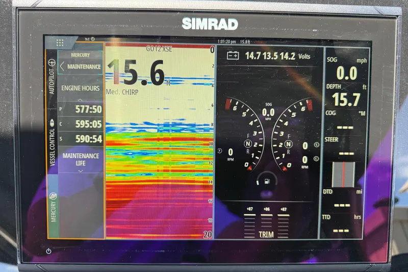 Slide: The Image of Simrad marine display showing depth, engine hours, and vessel control for 2021 Cruisers Yachts 38 GLS OB. - 48