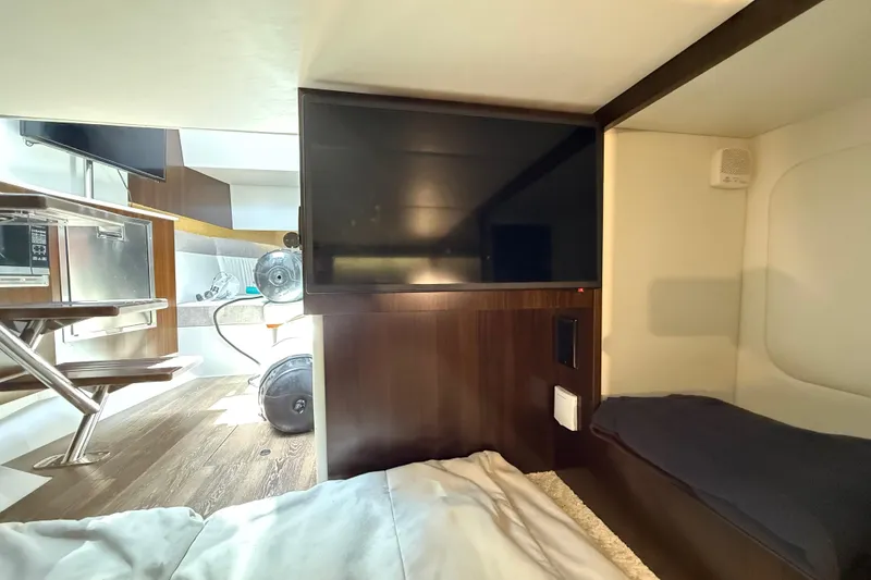 Slide: The Image of Interior of 2021 Cruisers Yachts 38 GLS OB with TV and modern amenities. - 53