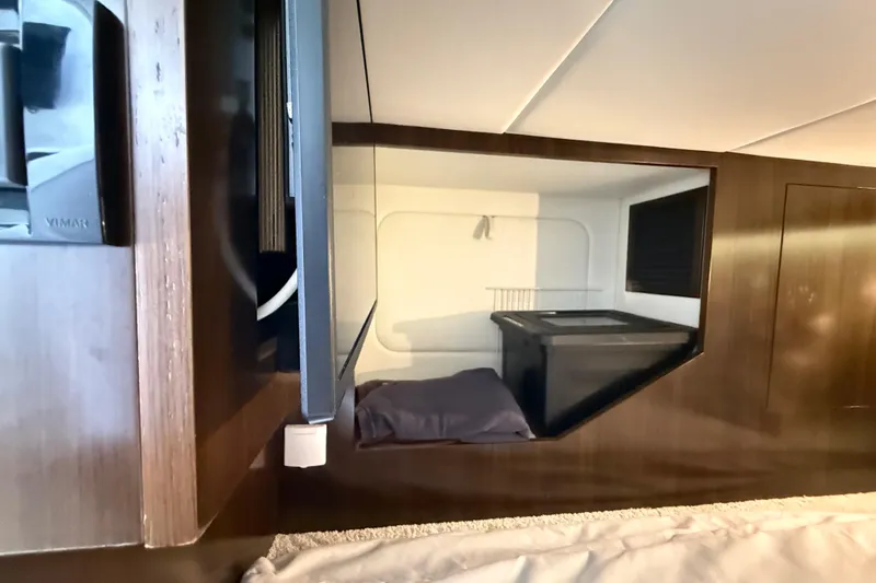 Slide: The Image of Interior cabin view of 2021 Cruisers Yachts 38 GLS OB, featuring modern design and amenities. - 54