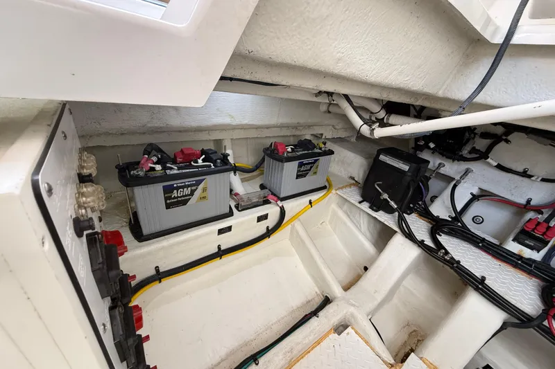 Slide: The Image of Engine compartment of 2021 Cruisers Yachts 38 GLS OB with AGM batteries and wiring. - 67