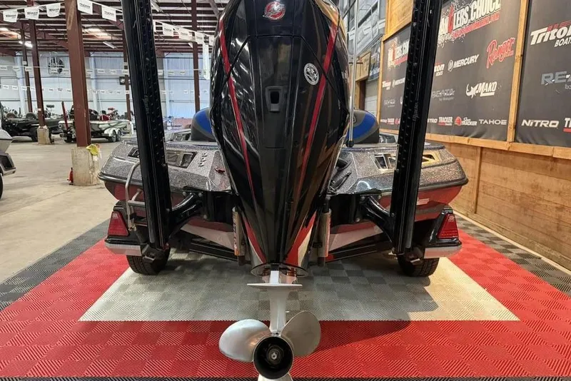 Slide: The Image of 2019 Ranger Z520L boat in showroom, rear view with motor and propeller. - 3