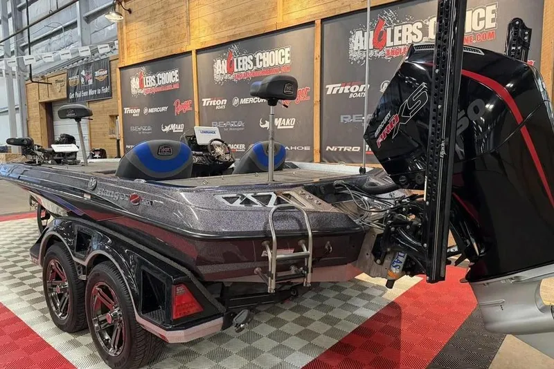 Slide: The Image of 2019 Ranger Z520L bass boat with powerful engine on display at Angler's Choice event. - 4