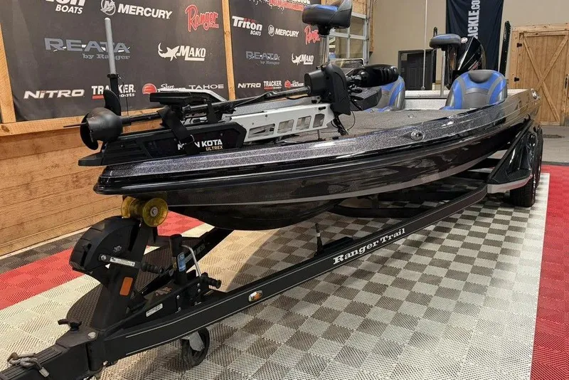 Slide: The Image of 2019 Ranger Z520L bass boat on trailer in showroom setting. - 6