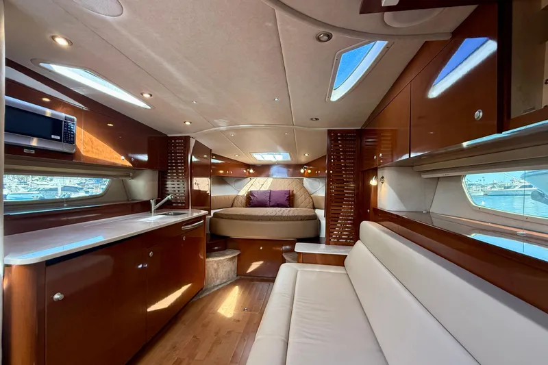 Slide: The Image of Luxurious interior of a 2009 Sea Ray Sundancer 350 yacht with modern amenities. - 4