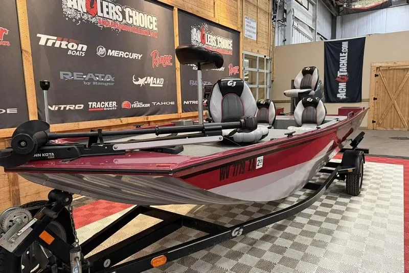 Slide: The Image of 2015 G3 Eagle 176 fishing boat on trailer in showroom setting. - 7