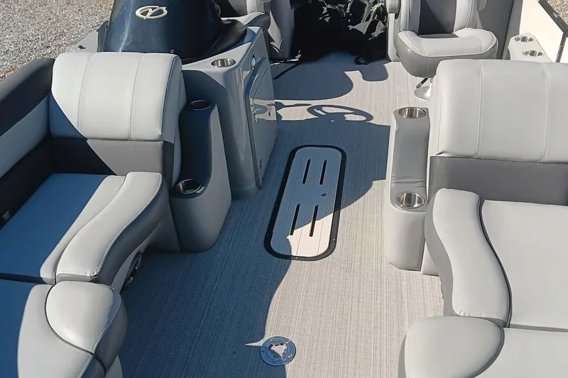 Slide: The Image of Interior of Veranda Relax VR22RC 2023 pontoon boat with gray seating. - 8