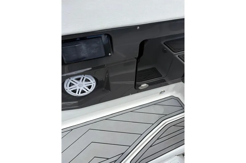 Slide: The Image of 2023 Monterey 255SS Super Sport boat interior with speaker and sleek flooring design. - 15