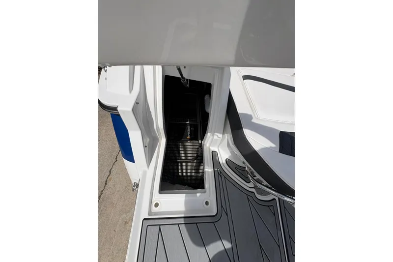 Slide: The Image of 2023 Monterey 255SS Super Sport boat interior with storage compartment open. - 19