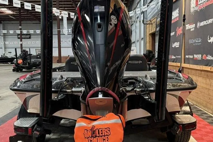 Slide: The Image of 2021 Phoenix 920 Elite boat in showroom with Angler's Choice bag. - 8
