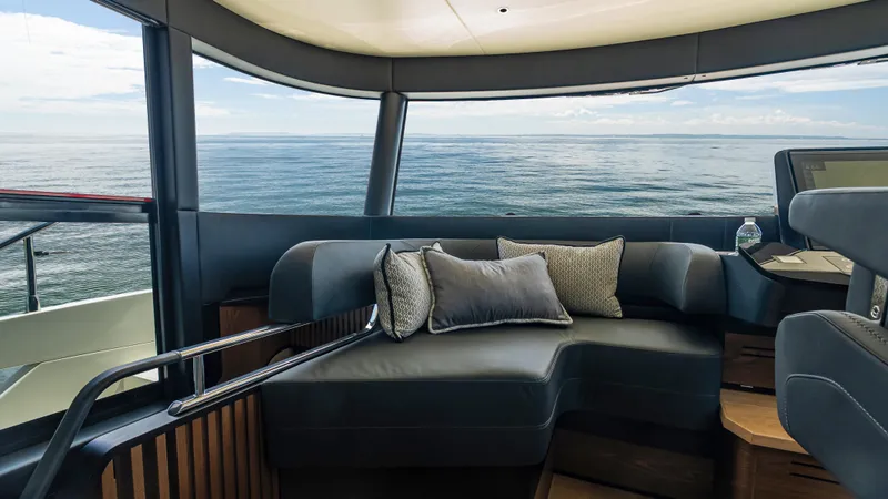 Slide: The Image of Luxurious interior of 2025 Absolute Navetta 64 yacht with ocean view. - 31