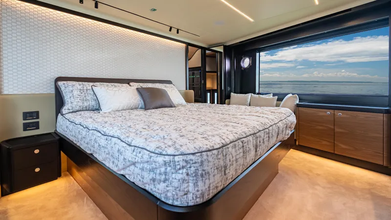 Slide: The Image of Luxurious bedroom interior of 2025 Absolute Navetta 64 yacht with ocean view. - 38