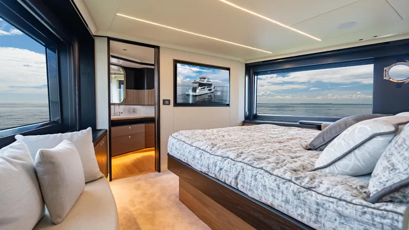Slide: The Image of Luxurious bedroom interior of 2025 Absolute Navetta 64 yacht with ocean view. - 39