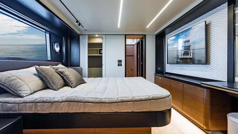 Slide: The Image of Luxurious bedroom interior of 2025 Absolute Navetta 64 yacht with ocean view. - 40