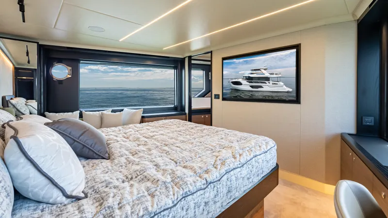 Slide: The Image of Luxurious bedroom interior of 2025 Absolute Navetta 64 yacht with ocean view. - 42