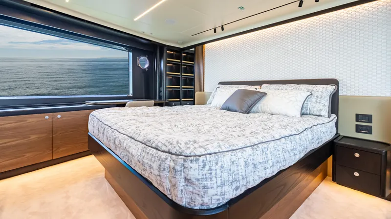 Slide: The Image of Luxurious bedroom interior of 2025 Absolute Navetta 64 yacht with ocean view. - 43